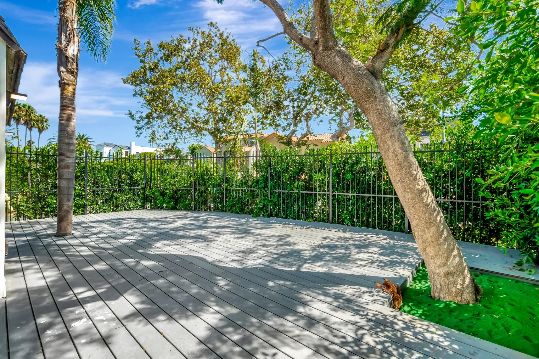 1145 S Longwood Ave Mid-Wilshire — Outdoor: Private deck space with mature trees and modern railings