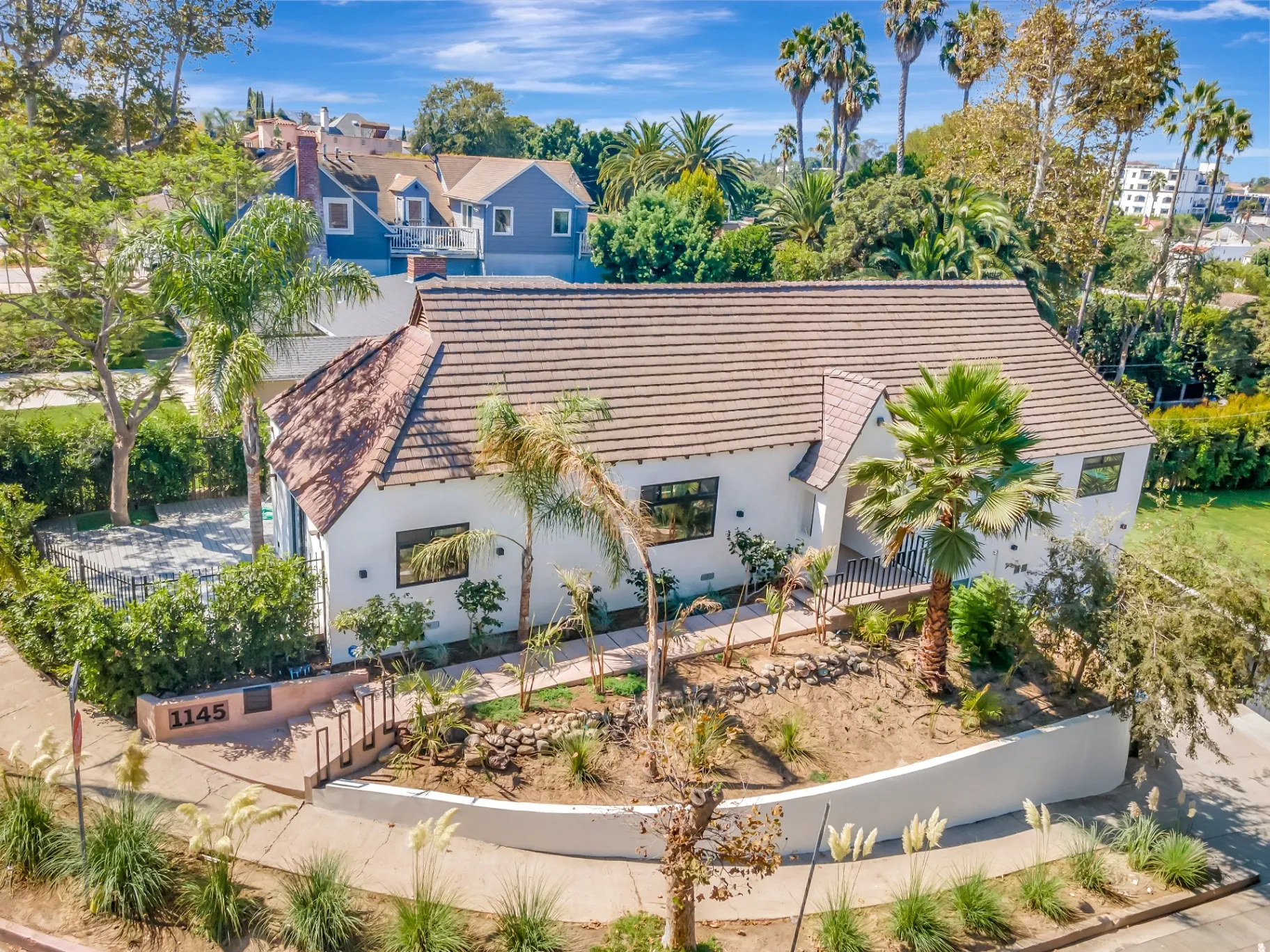 1145 S Longwood Ave Mid-Wilshire — Exterior: Aerial view of 1145 S Longwood Ave with desert landscaping and modern architecture