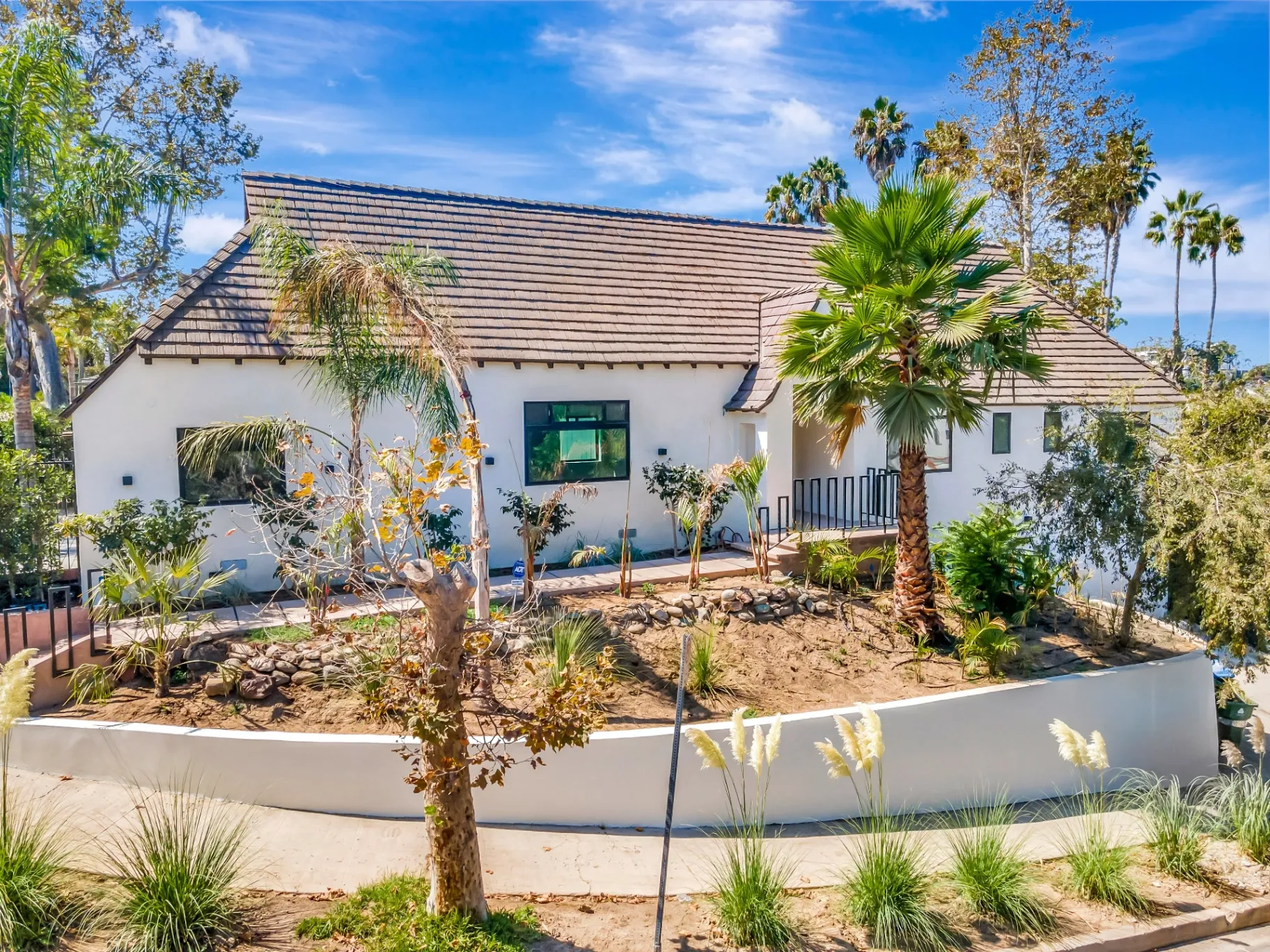 1145 S Longwood Ave Mid-Wilshire — Exterior: Wood shake roof detail and contemporary architectural elements