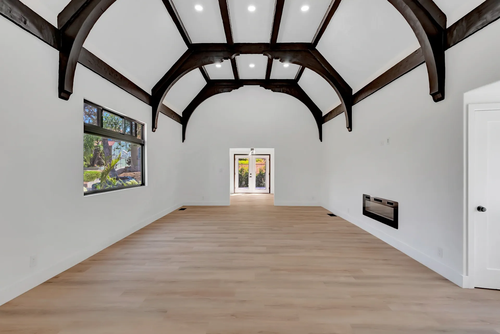 1145 S Longwood Ave Mid-Wilshire — Living: Grand living space with vaulted ceiling and dramatic exposed beams