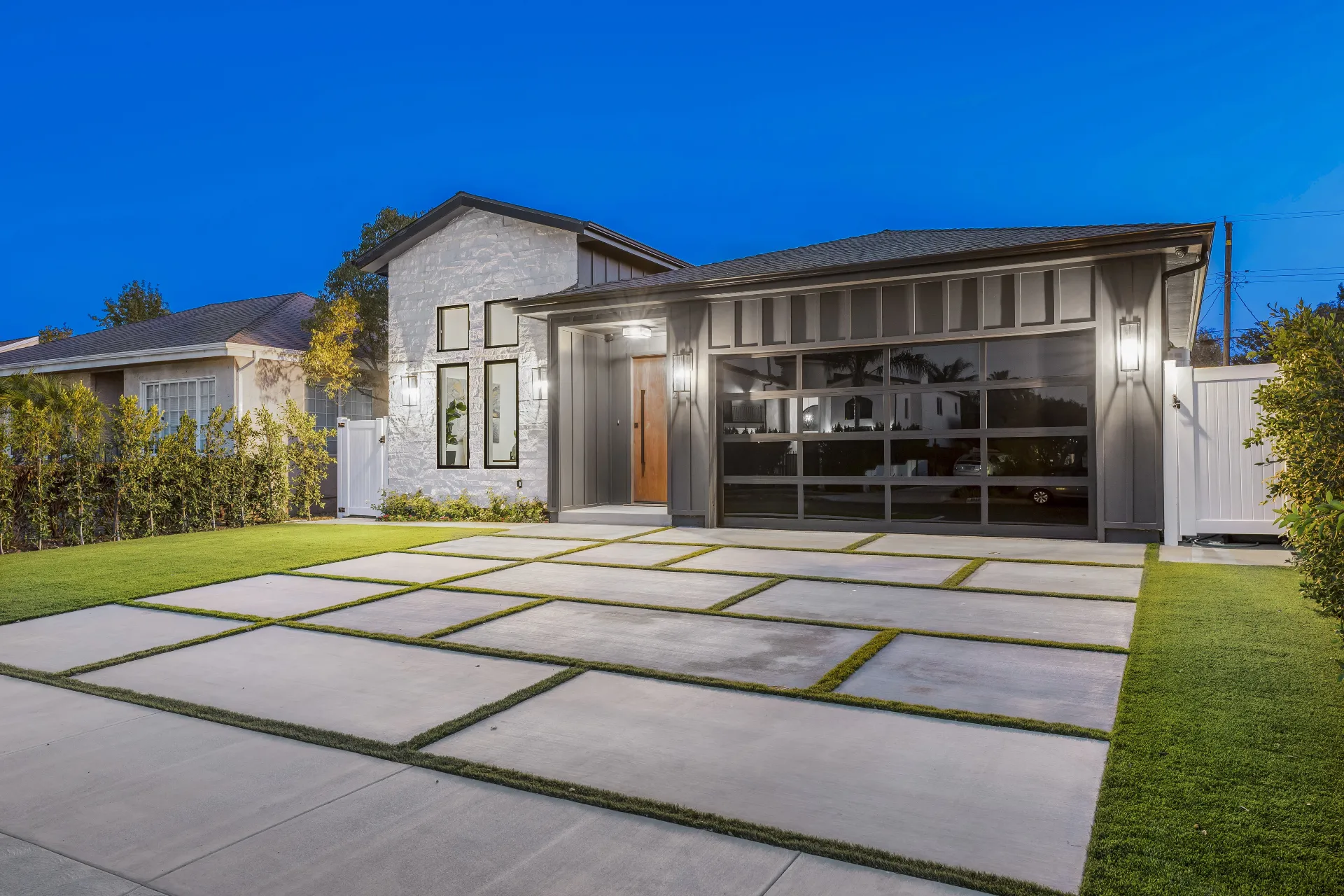 14602 Morrison St — modern farmhouse front elevation at twilight