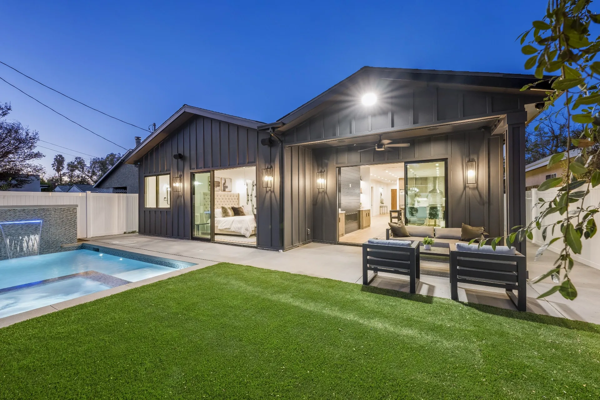 14602 Morrison St — Backyard: Modern farmhouse exterior with pool, outdoor seating area, and contemporary outdoor furniture
