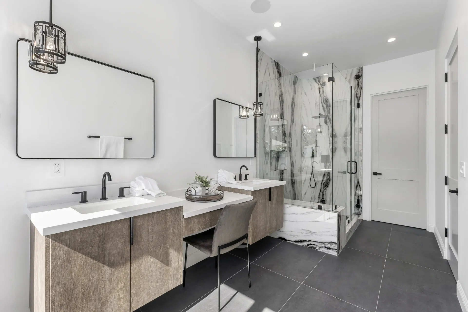 14602 Morrison St — Bathrooms: Primary spa like bathroom with dual vanities, marble shower, and crystal chandeliers