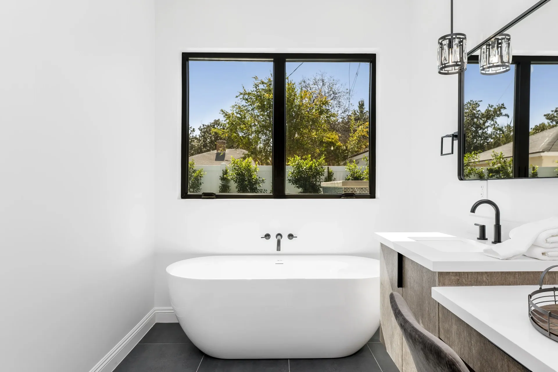 14602 Morrison St — Bathrooms: Spa like bathroom featuring freestanding tub with garden views and floating vanity