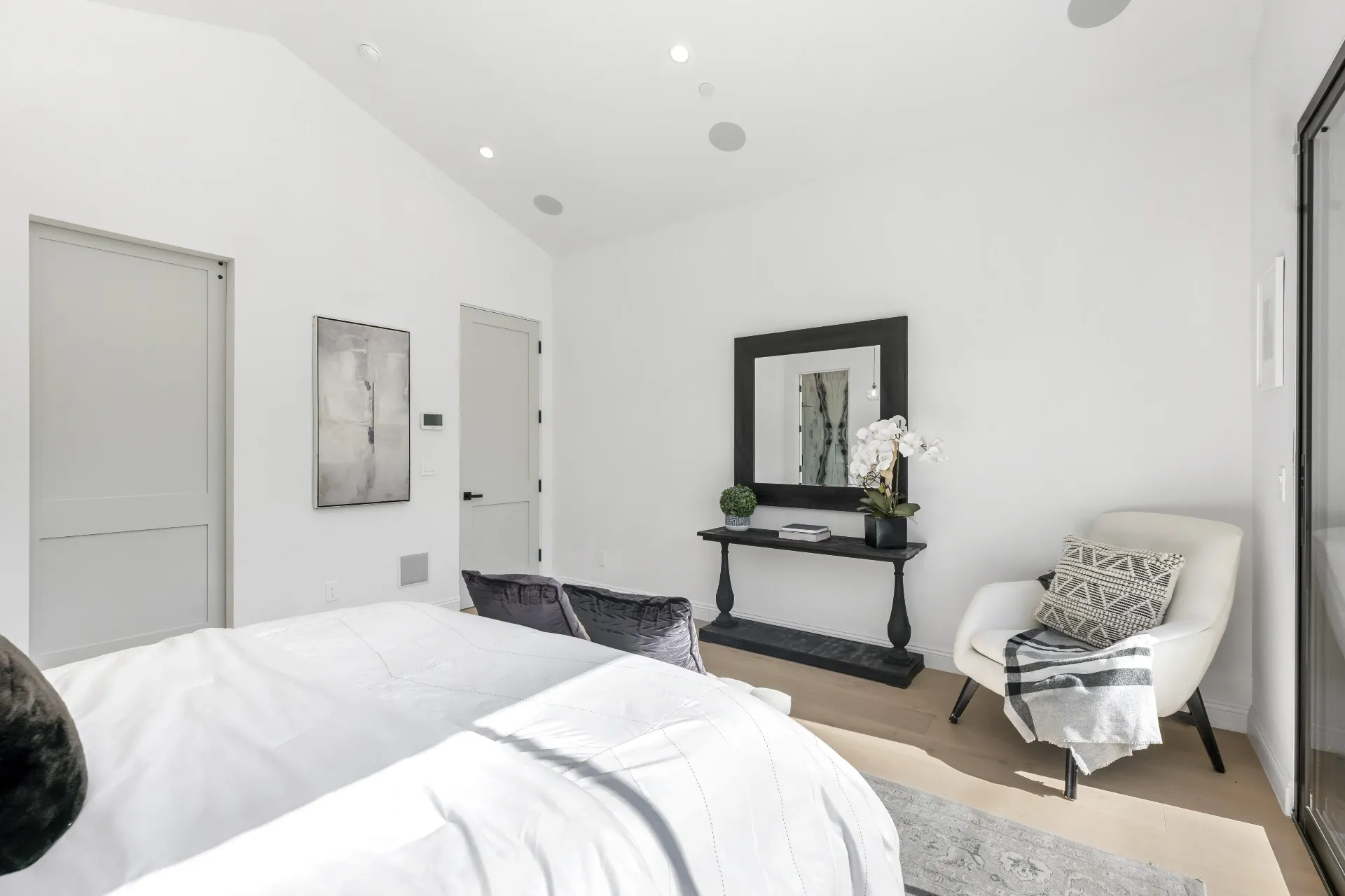 14602 Morrison St — Bedrooms: Bedroom with built-in console table and custom artwork