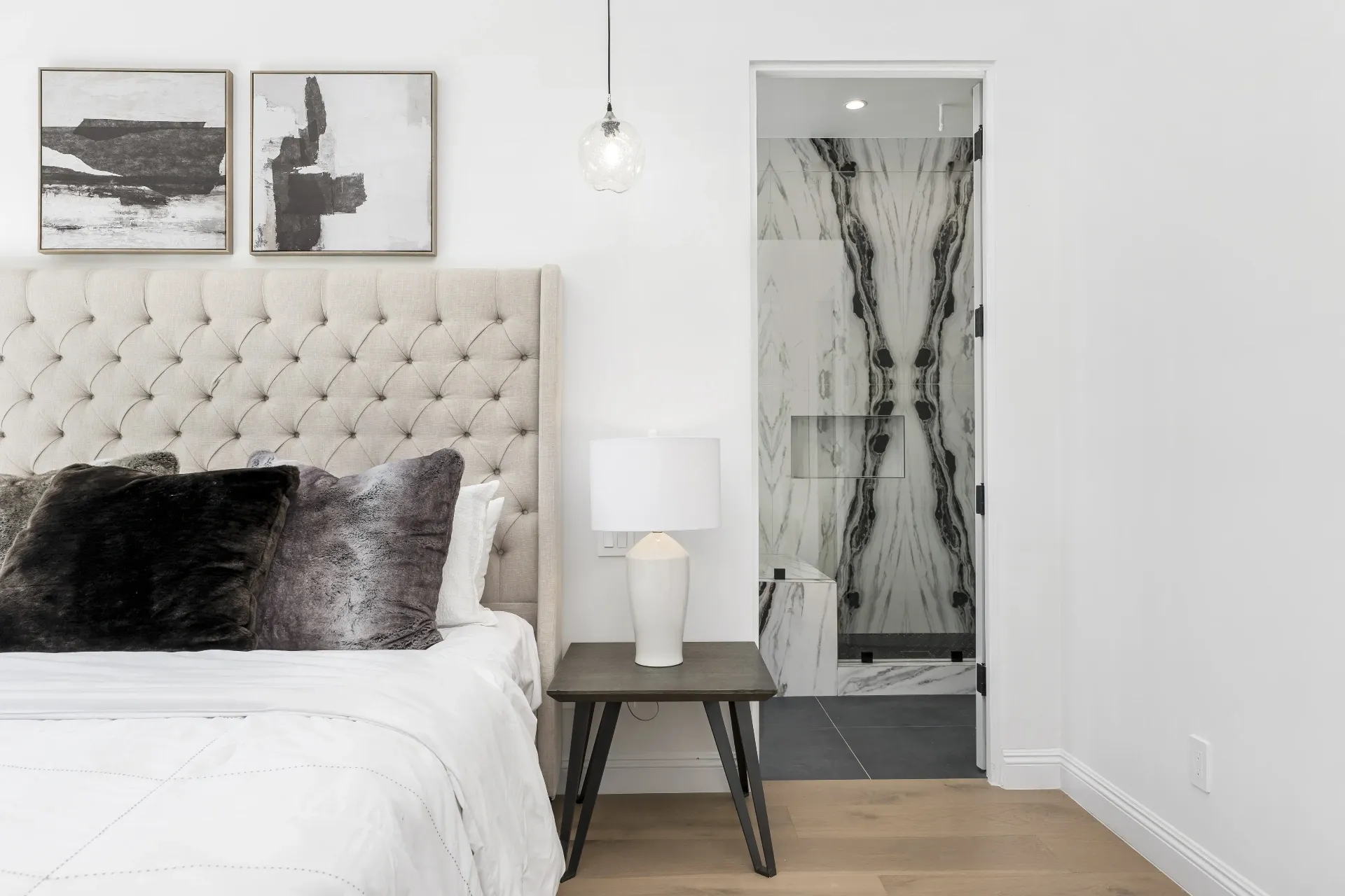 14602 Morrison St — Bedrooms: Primary suite with tufted headboard and marble bathroom entry