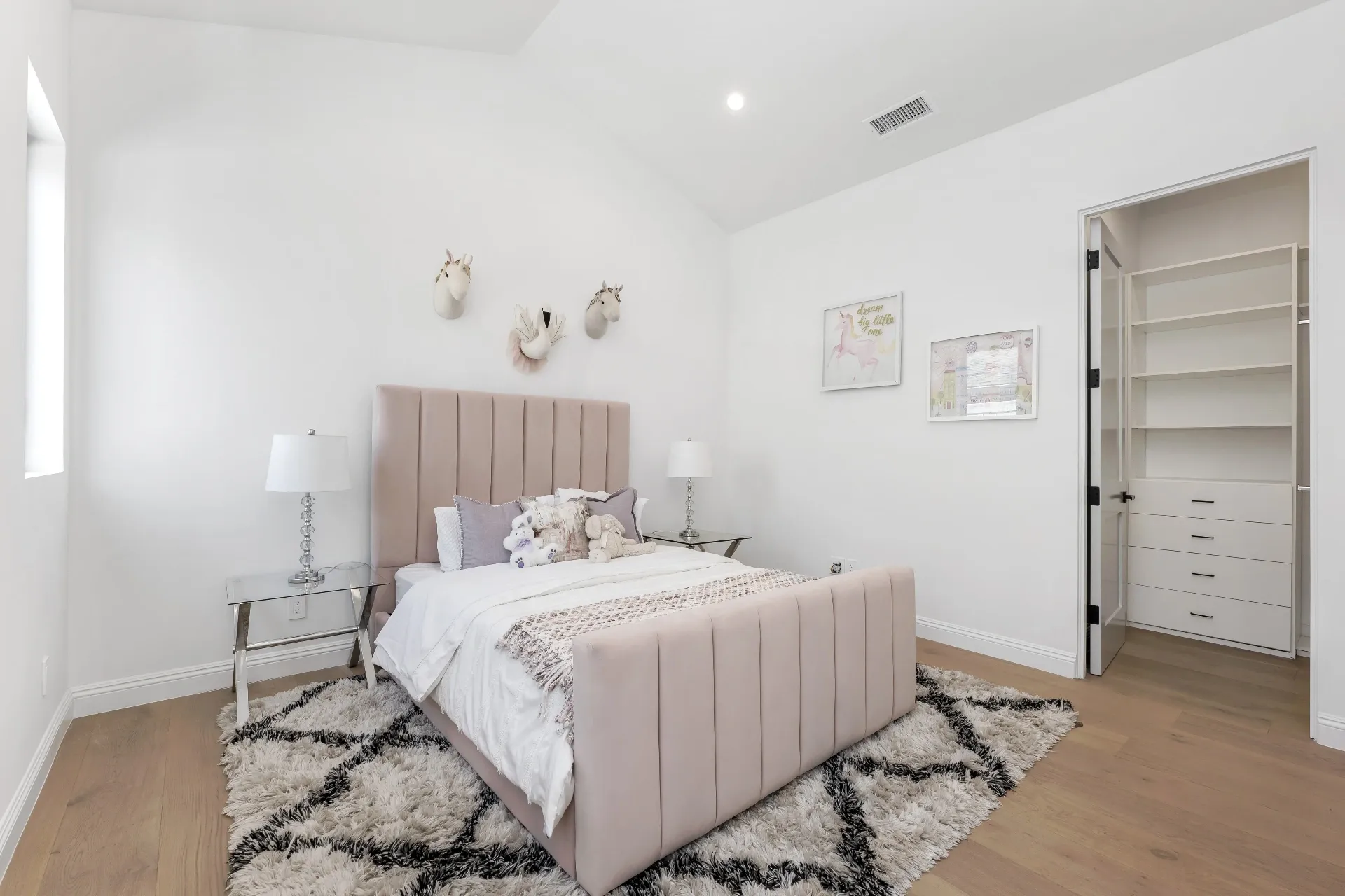 14602 Morrison St — Bedrooms: Children's bedroom with pink upholstered bed and built-in closet