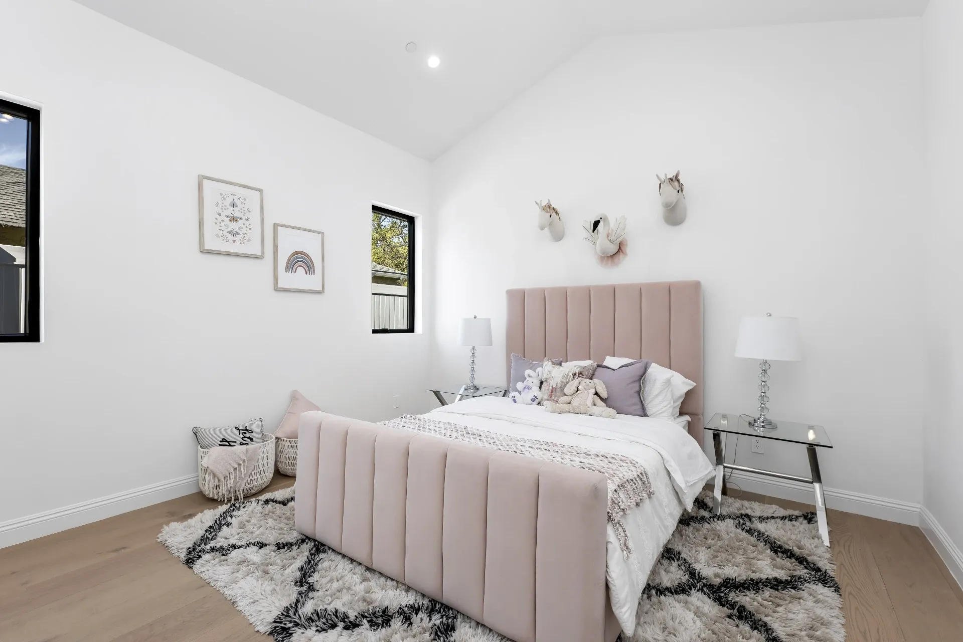 14602 Morrison St — Bedrooms: Kids' room with pink channeled headboard and whimsical wall decor