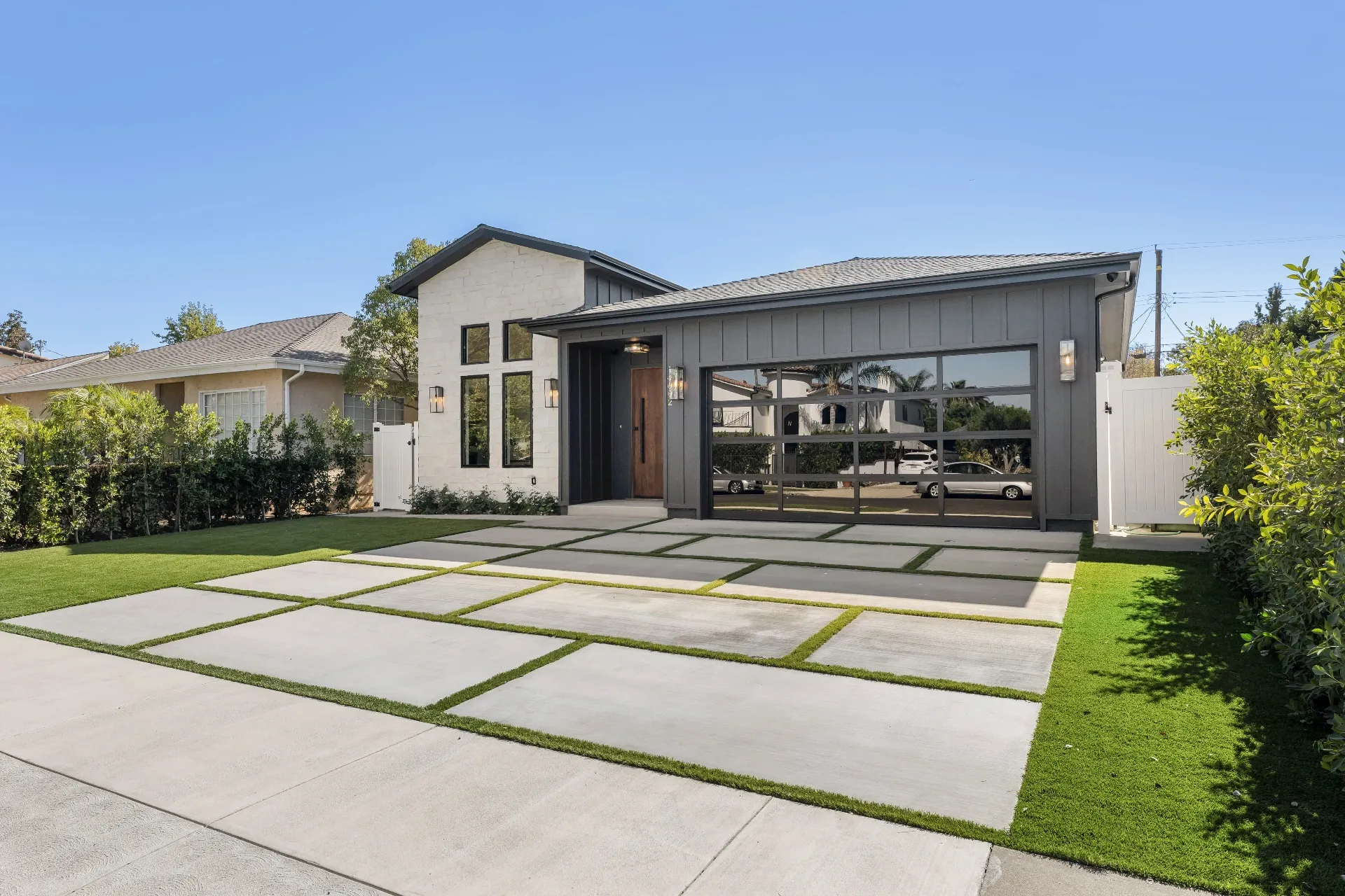 14602 Morrison St — Exterior: Street view showing full property frontage with landscaped lawn