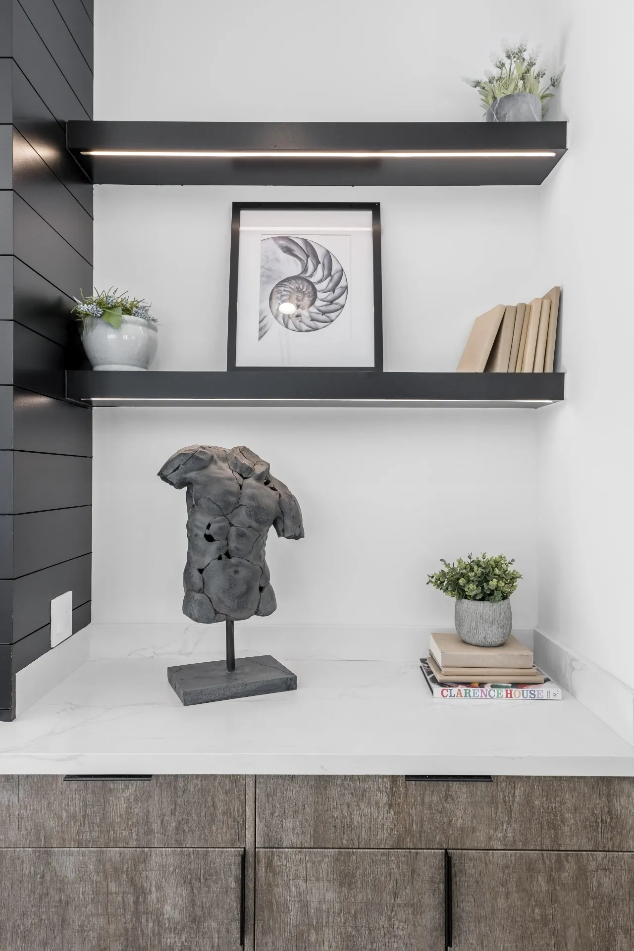 14602 Morrison St — Living Areas: Built-in shelving with floating shelves, contemporary sculpture, and curated decor