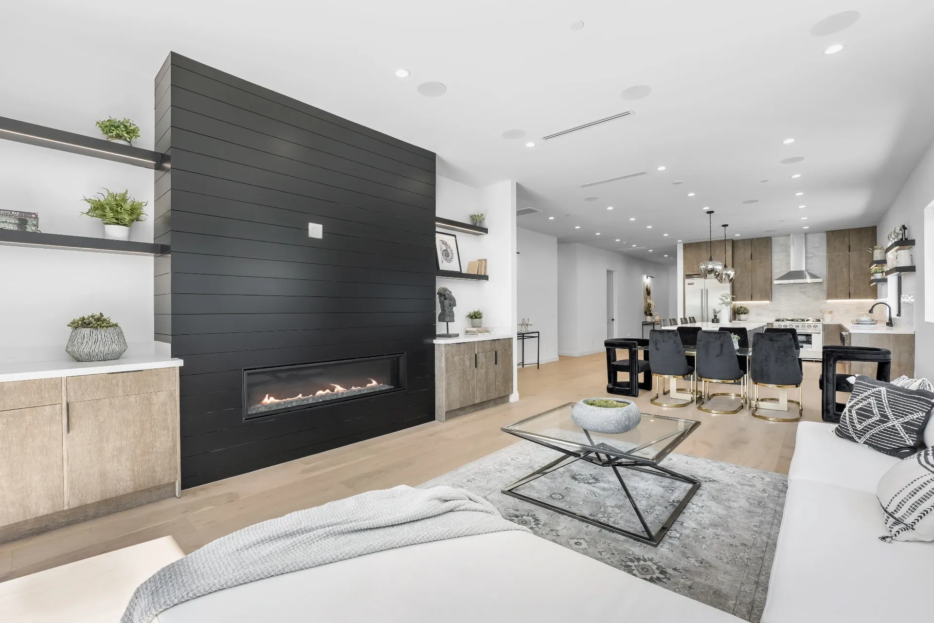 14602 Morrison St — Living Areas: Open-concept great room with linear fireplace and kitchen views