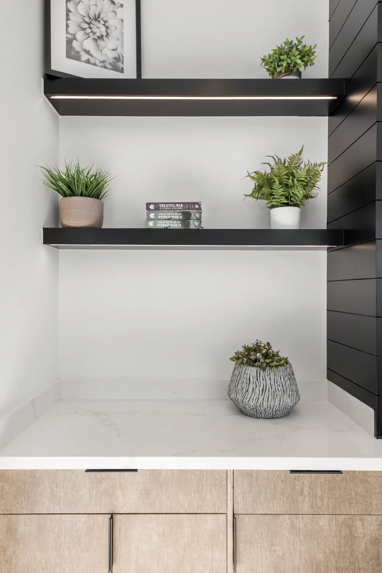 14602 Morrison St — Living Areas: Built-in shelving detail with under-shelf lighting and decorative accessories