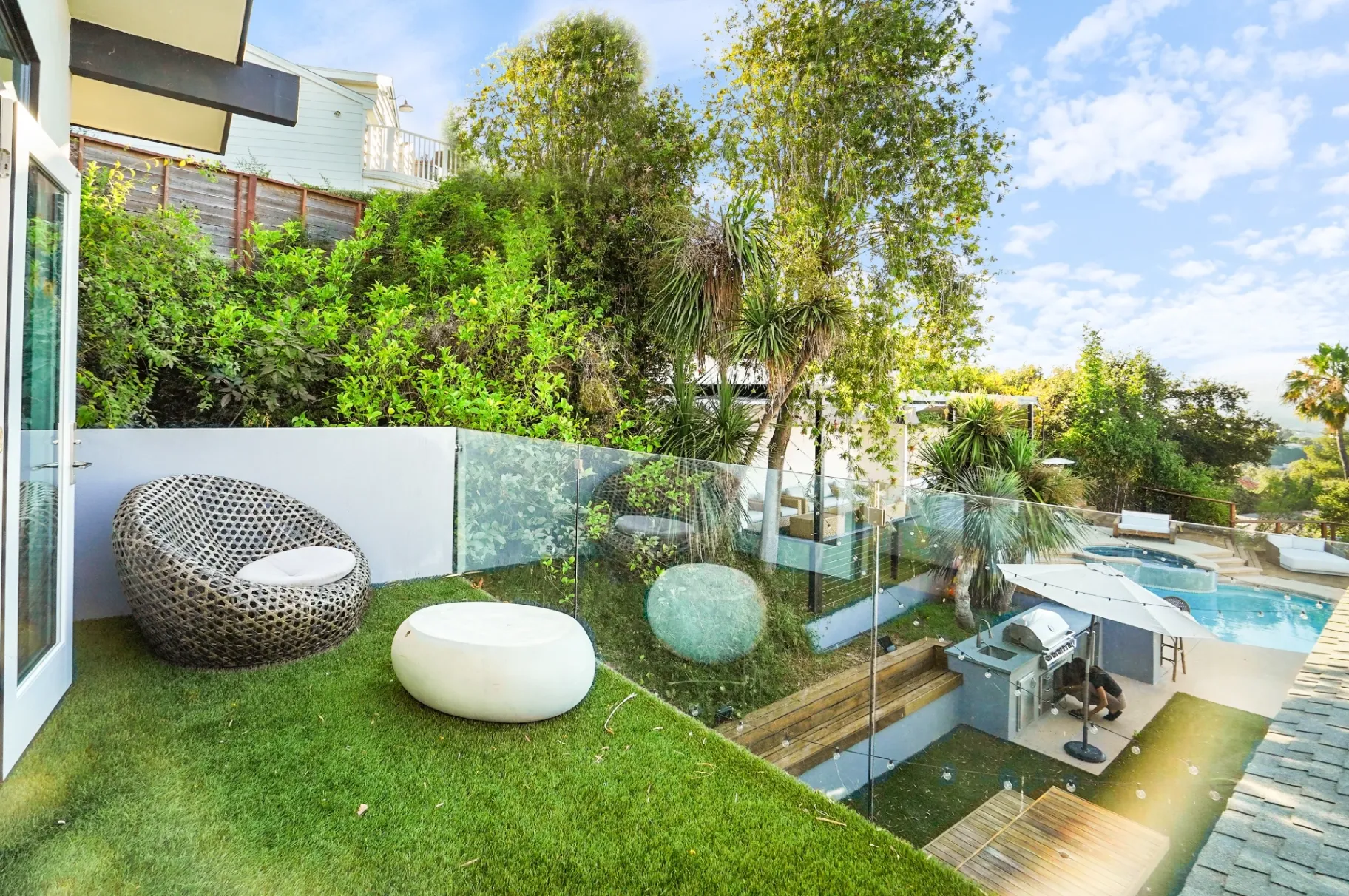 11308 Dona Teresa Dr — Backyard: Upper deck with modern seating overlooking pool area and outdoor entertaining space