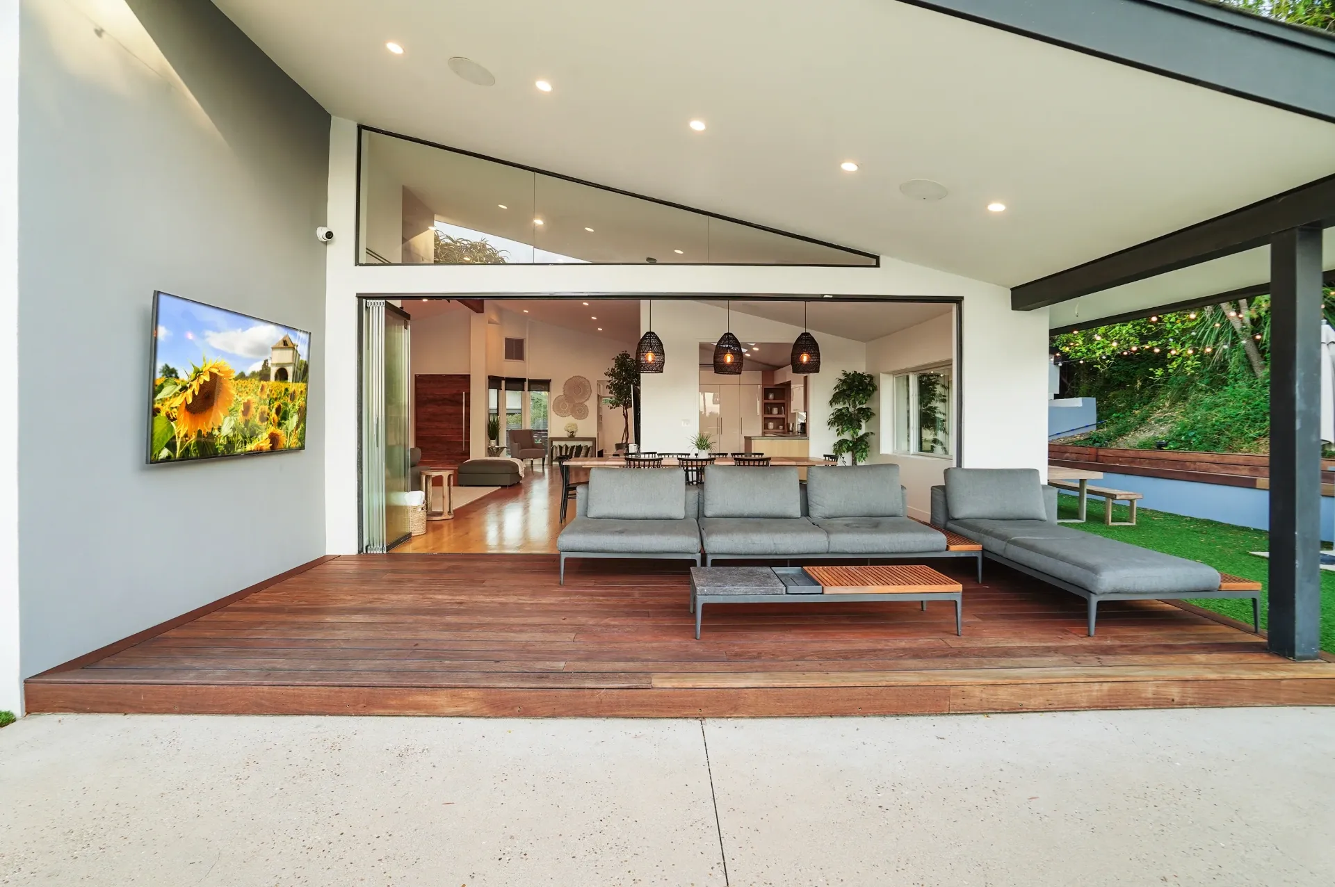 11308 Dona Teresa Dr — Backyard: Covered patio with outdoor sectional seating flowing seamlessly to interior spaces