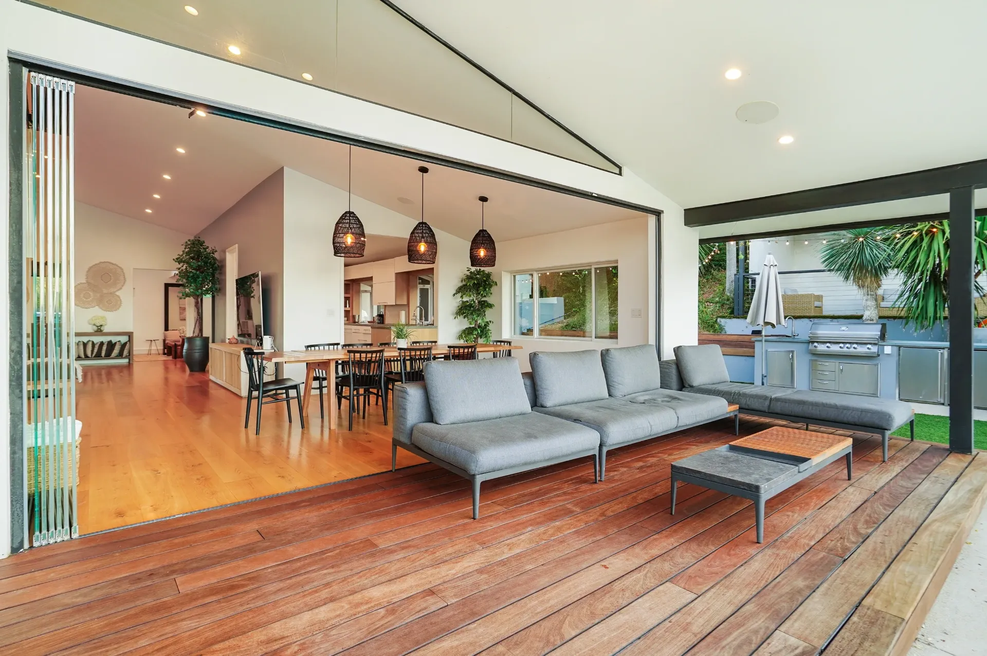 11308 Dona Teresa Dr — Backyard: Indoor-outdoor living area with retractable glass walls and pool deck access