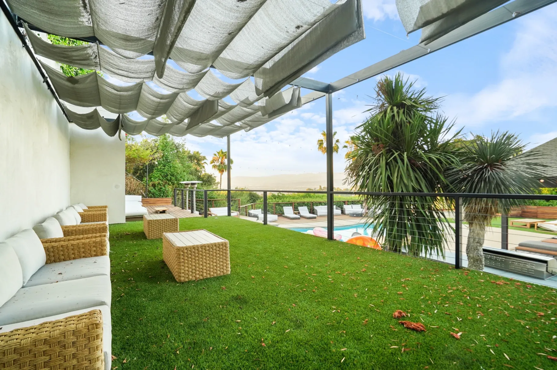 11308 Dona Teresa Dr — Backyard: Pergola covered seating area with wicker furniture overlooking pool and valley views