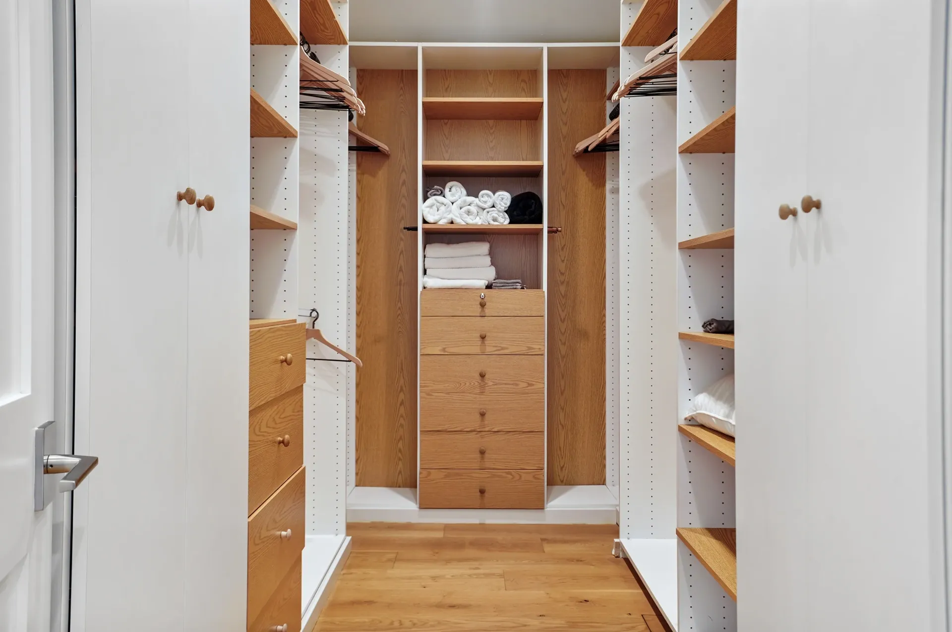 11308 Dona Teresa Dr — Bedrooms: Custom walk-in closet with wood shelving, organized storage, and natural lighting