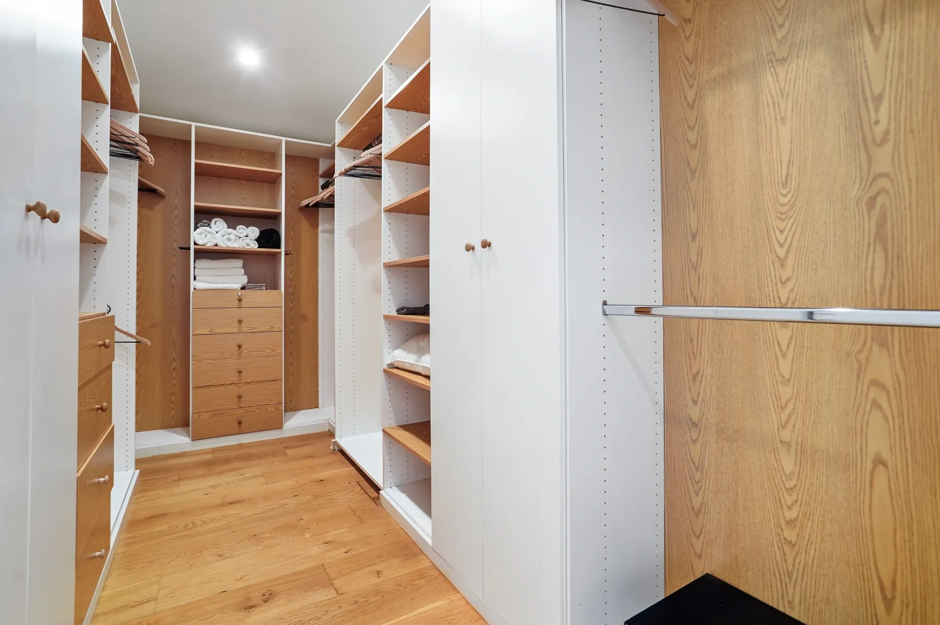 11308 Dona Teresa Dr — Bedrooms: Detailed view of custom walk-in closet with wood shelving and organized storage systems