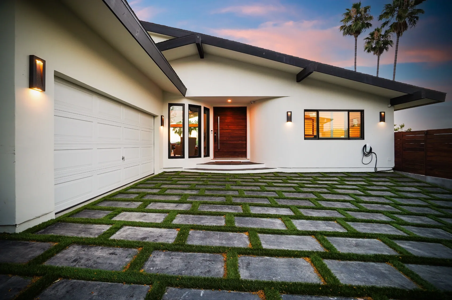 11308 Dona Teresa Dr — Exterior: Twilight front view with warm interior lighting illuminating the modern entrance and architectural details