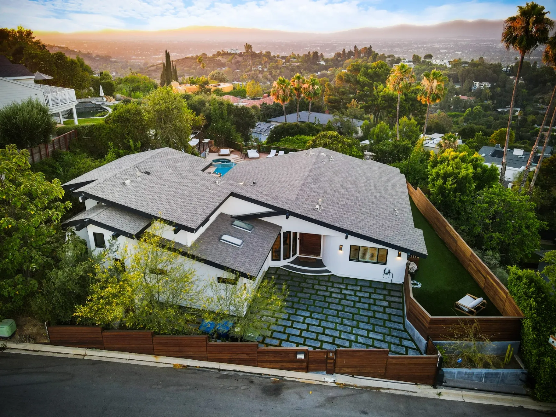 11308 Dona Teresa Dr — Exterior: Comprehensive aerial overview showing complete property layout with geometric driveway and hillside location