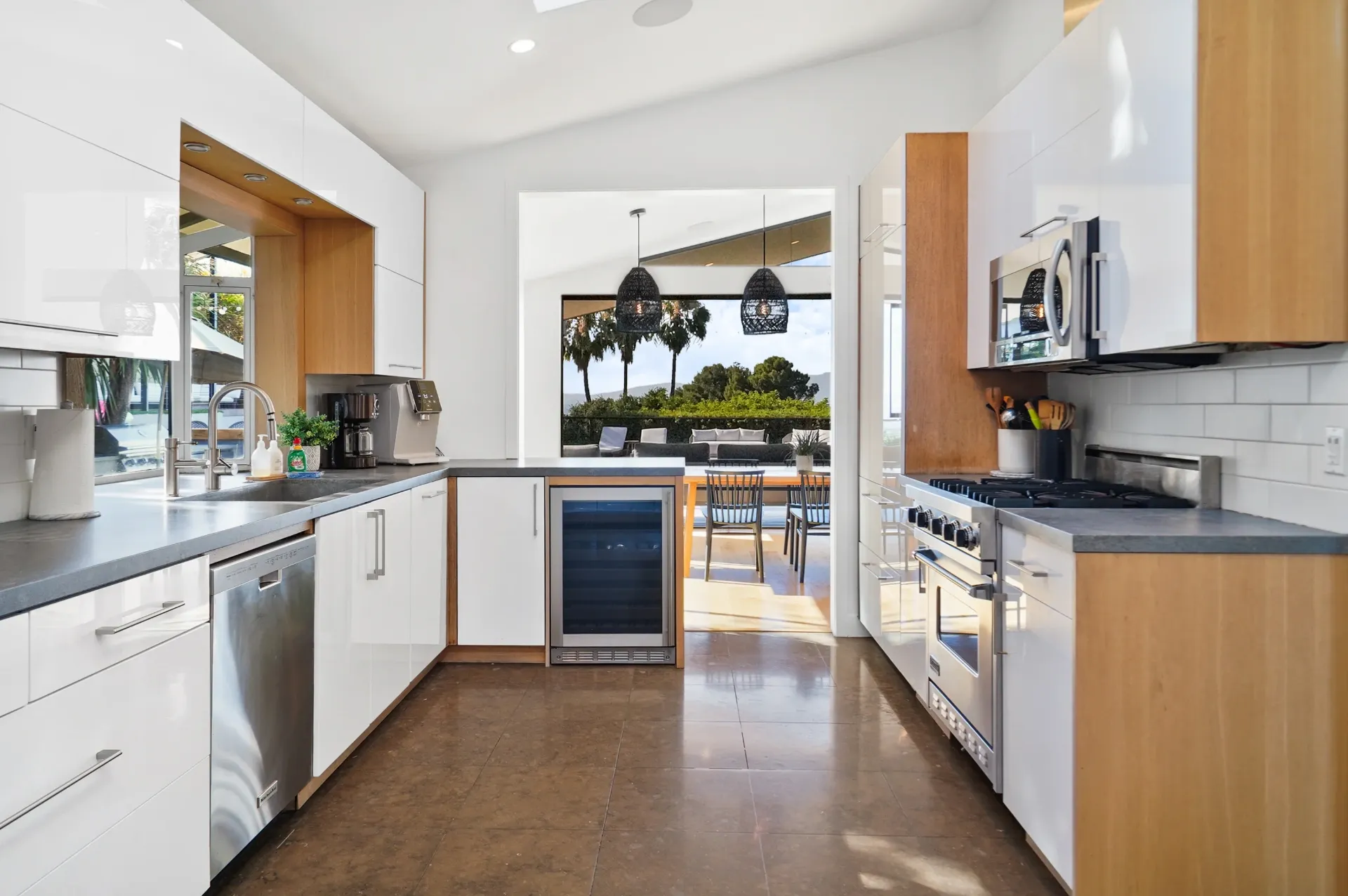 11308 Dona Teresa Dr — Kitchen: Kitchen with view through to dining area and outdoor entertaining space