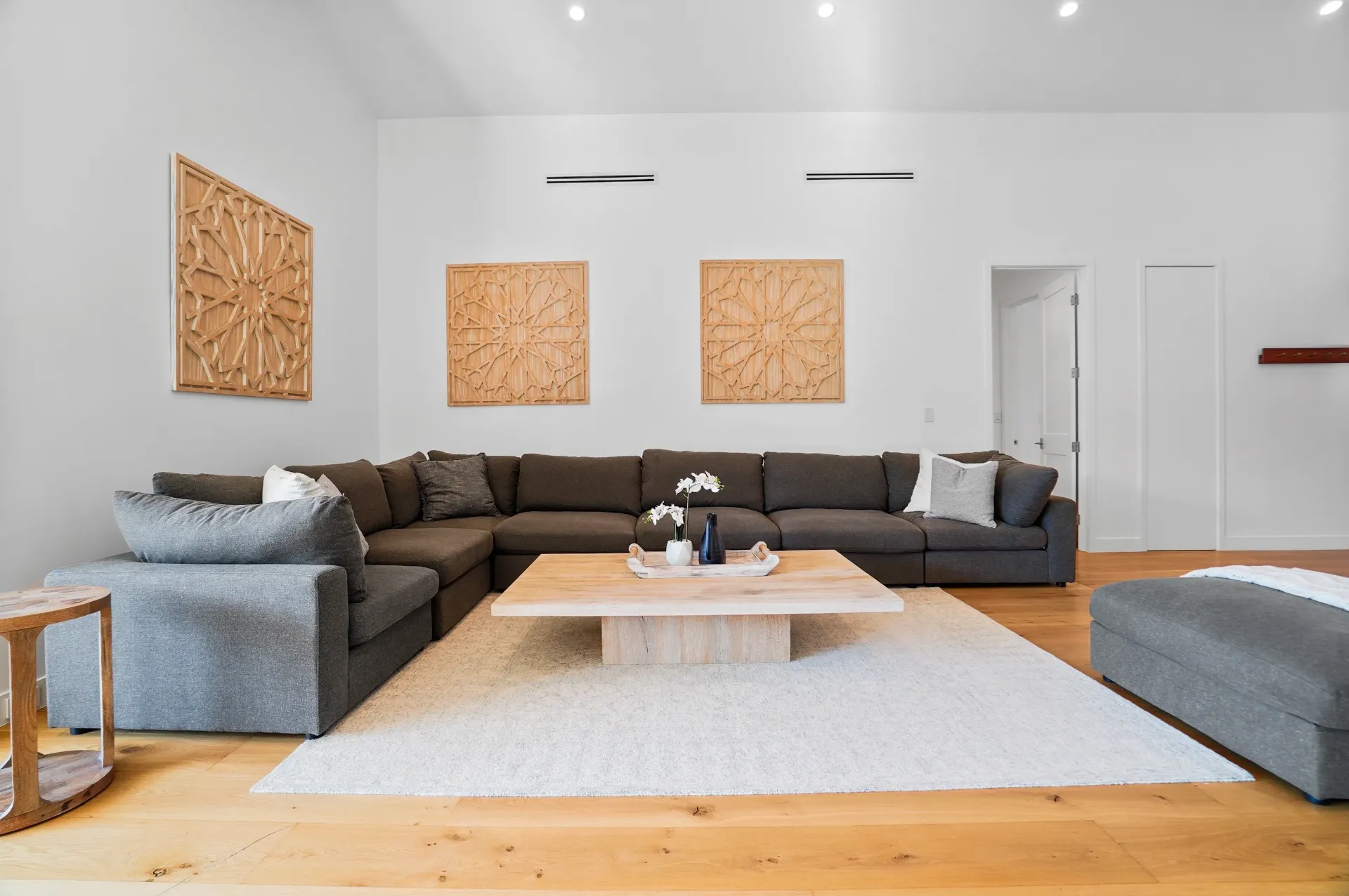 11308 Dona Teresa Dr — Living Areas: Family room with L-shaped sectional and wood beam ceiling details