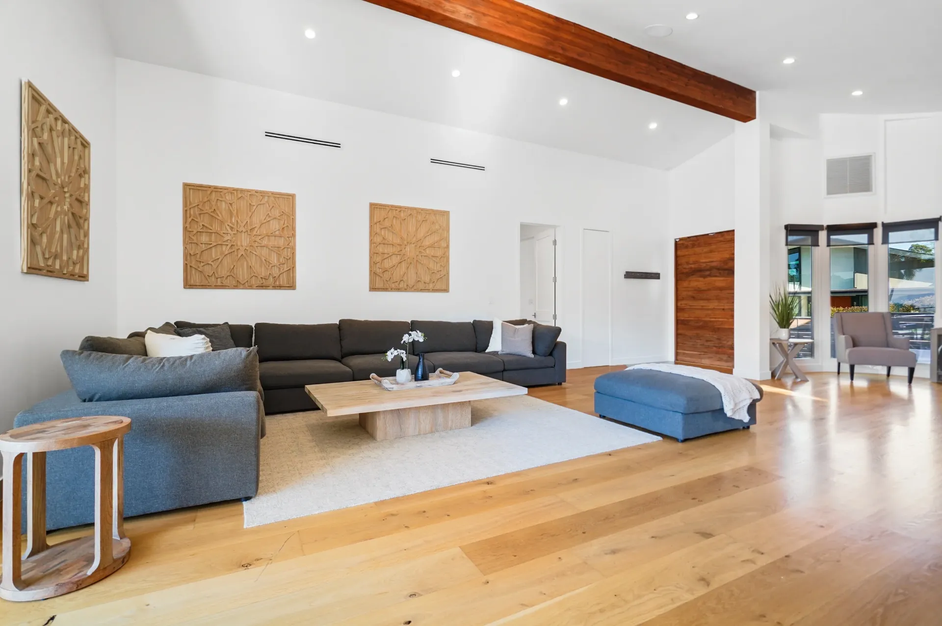 11308 Dona Teresa Dr — Living Areas: Lounge area with statement beam and geometric wood artwork