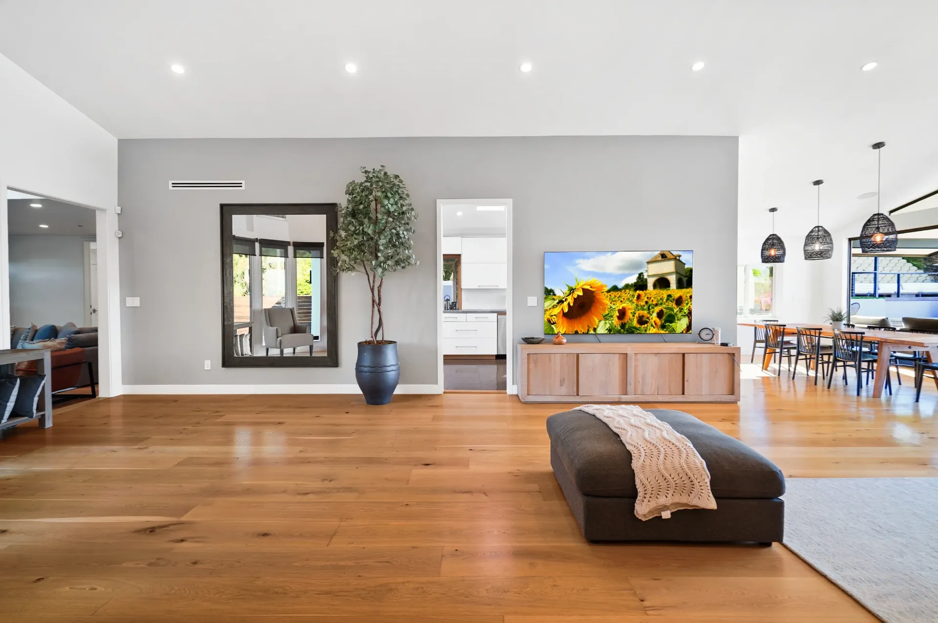 11308 Dona Teresa Dr — Living Areas: Great room with accent wall and open flow to kitchen and dining