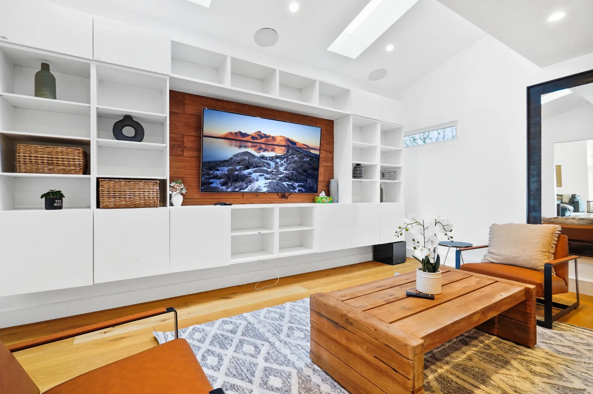 11308 Dona Teresa Dr — Living Areas: Media room with full-height built-in entertainment center and skylights