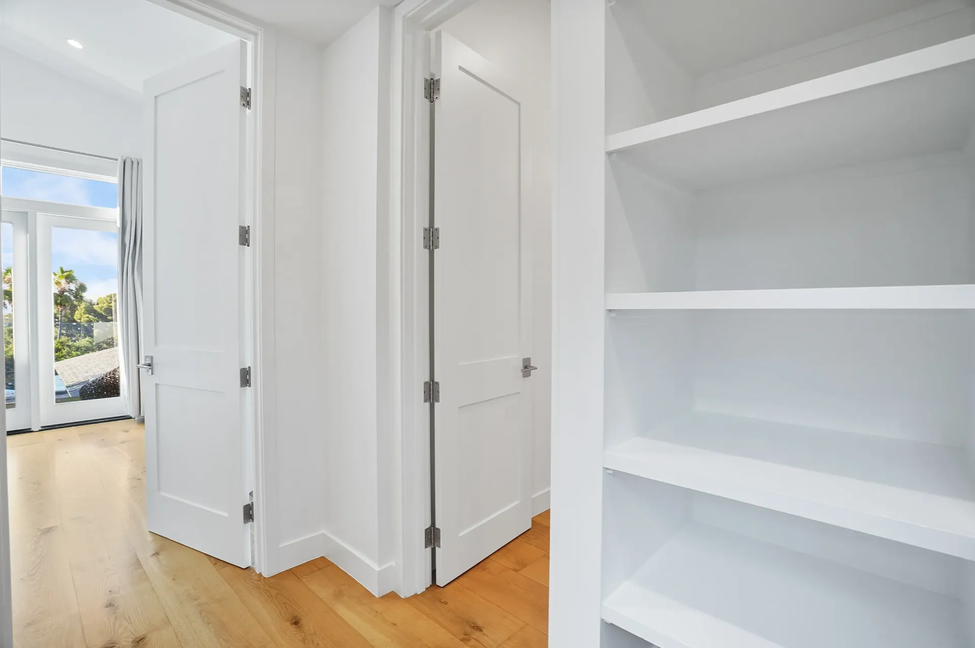 11308 Dona Teresa Dr — Living Areas: Storage closet with custom white shelving and organized interior space