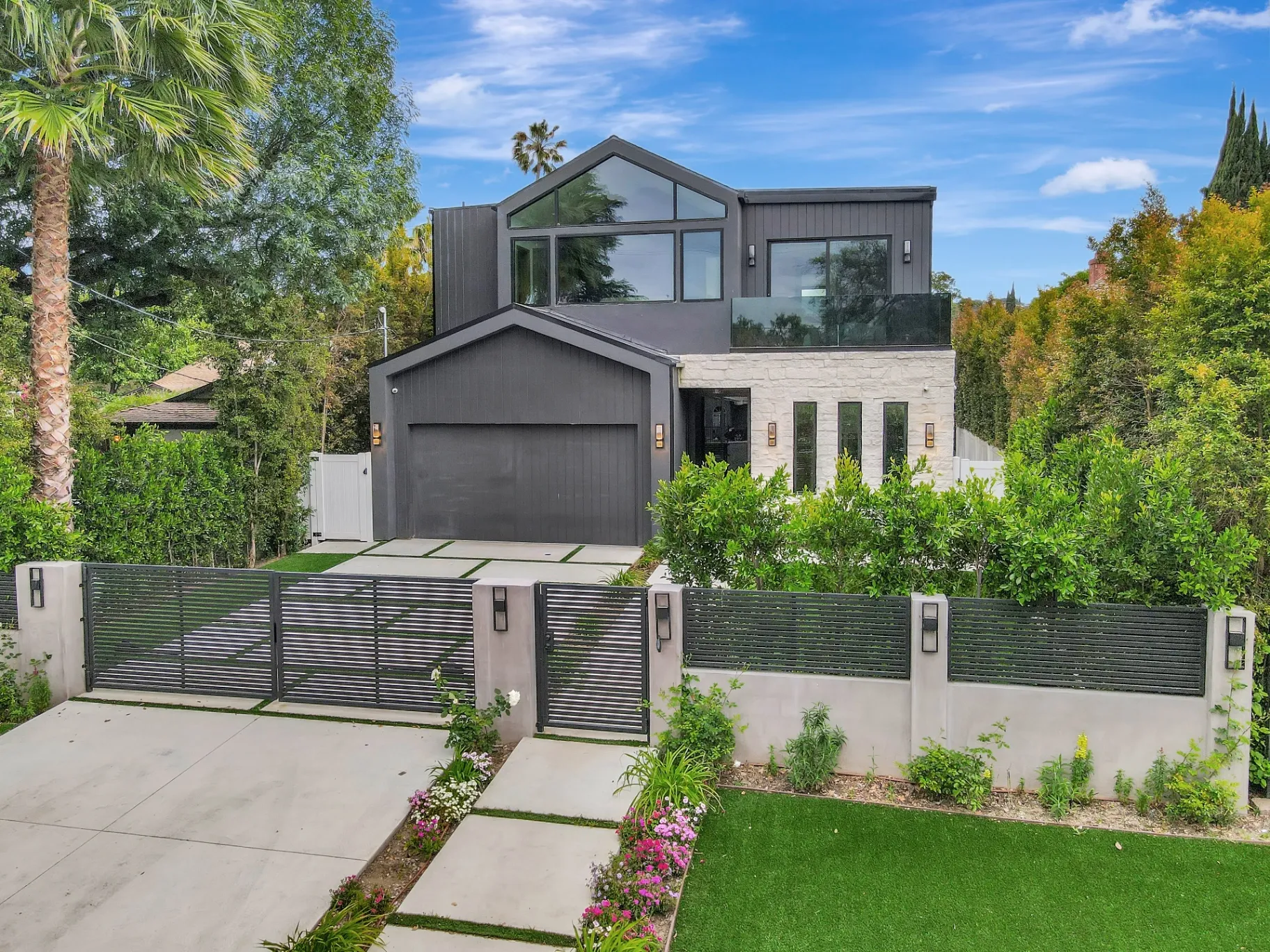 15602 Morrison St — Exterior: 15602 Morrison St — Modern contemporary home exterior with horizontal-slat gate, artificial turf landscaping, and two-story design