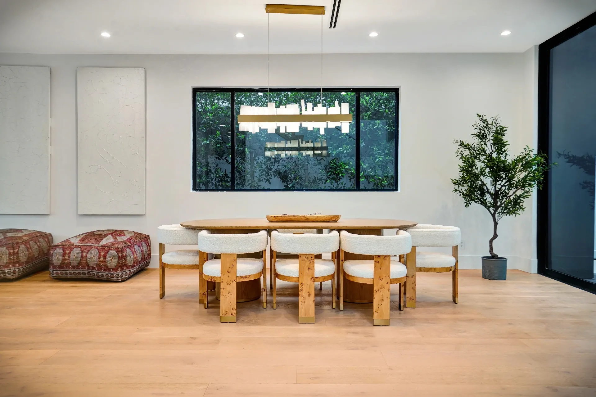 15602 Morrison St — Kitchen: 15602 Morrison St — Dining room with live-edge wood table, upholstered chairs, modern chandelier, and floor-to-ceiling windows