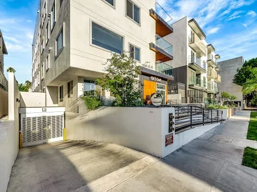 124 S Croft Ave — Exterior: Modern residential building street view showing contemporary Los Angeles architecture