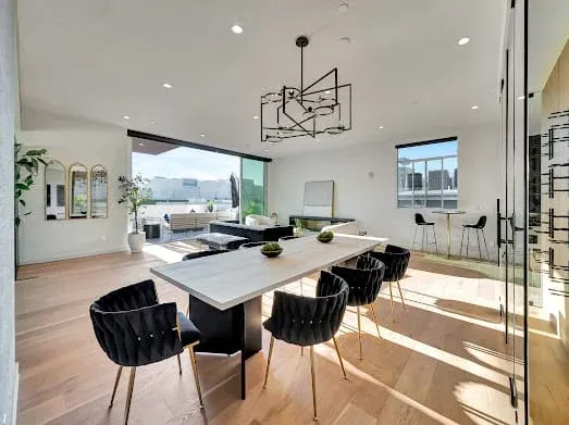 124 S Croft Ave — Dining: Open dining space with geometric lighting and city views