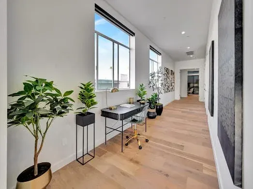 124 S Croft Ave — Living Areas: Contemporary workspace with built-in desk and landscaped city views